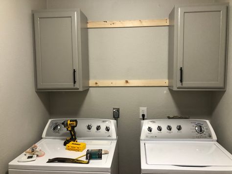 Affordable DIY Laundry Room Makeover - Life With The Hollidays Cheap Laundry Room Makeover, Diy Laundry Room Cabinets, Laundry Wallpaper, Storage Laundry Room, Small Laundry Closet, Wallpaper Laundry, Laundry Quotes, Diy Laundry Room Makeover, Laundry Closet Makeover