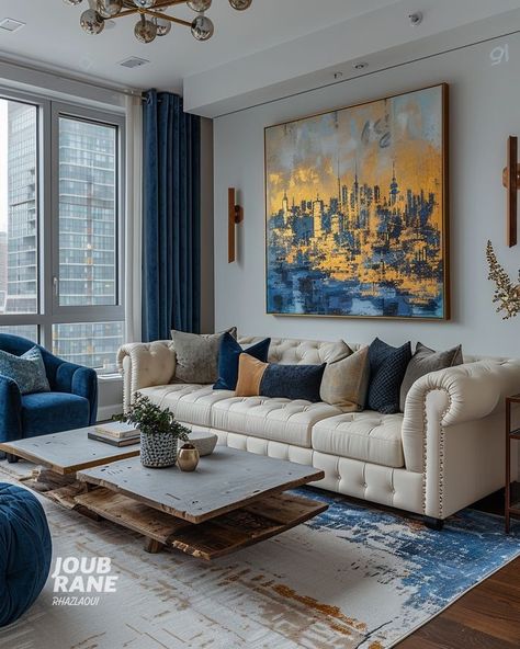 Blue Gold And White Interior, Blue And Gold Accents Living Rooms, Blue White And Gold Living Room, Living Room Blue And Gold, Cream And Blue Living Room, Cream Leather Sofa Living Room, Street Style Living Room, Gold Accents Living Room, Leather Sofa Blue