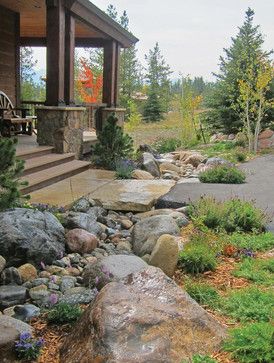 Landscaping Ideas For Mountain Home, Landscaping With Boulders And Grasses, Mountain Yard Landscape, Mountain Lodge Landscaping, Colorado Mountain Landscaping Ideas, Hardscapes Front Yard, Mountain Home Landscaping Ideas, Cabin Landscape Ideas, Landscaping With Rocks Around House