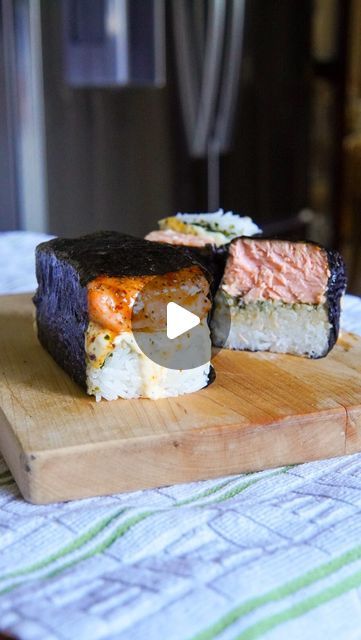 Andy on Instagram: "just a little sweet and spicy, like you  were back again with our musubi and this time I made you all this heavily seasoned salmon musubi and she’s a thicc, sweet, spicy, and balanced with some citrus to cut it all down. Ngl I made a mess with this one but it was all finger licking great. As always all these recipes make perfect rice dishes too! Enjoy my musubaes💛  Honey Butter Cajun Salmon Musubi Recipe: honey butter cajun salmon: 1.5 lbs or 2 pieces of salmon 2 tbsp butter 1.5 tbsp honey 1 tsp garlic powder 1 tsp italian seasoning 1 tsp paprika 1 tsp cayenne pepper 1 tsp onion power 1/2 tsp pepper 1/2 tsp salt 1/2 tsp red pepper flakes  lemon mayo: 3 tbsp kewpie 1 tsp lemon  everything else: cooked rice furikake nori  1. cook rice 2. slice salmon into ‘musubi’ sized, Salmon Musubi, Honey Cajun Salmon, Salmon And Sushi Rice, Kewpie Mayo Salmon, Salmon Rice Kewpie Mayo, Crab And Salmon Sushi Bake, Salmon And Rice Sushi, Musubi Recipe, Seasoned Salmon