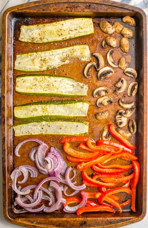 Sheet pan of roasted veggies including zucchini, mushrooms, red bell pepper and red onions Roasted Veggie Wraps, Roasted Vegetable Wrap, Roasted Veggie Wrap, Vegetable Wraps Recipes, Roasted Veggie Wrap Recipe, Pesto And Goat Cheese, Vegetarian Wrap, Zucchini Mushrooms, Office Lunches