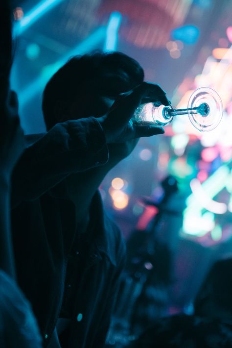 Man Drinking from Glass in Nightclub · Free Stock Photo Bar Pics, Man Drinking, He Cheated, Night Club Aesthetic, Neon Noir, Colorful Lights, Clubbing Aesthetic, Cheated On, Drink Photo