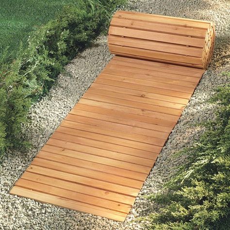 You Can Get A Roll-Out Wooden Walkway That Will Set Up A Backyard Path In Seconds Wooden Pathway, Yard Pathway, Wood Walkway, Backyard Walkway, Outdoor Walkway, Wooden Walkways, Garden Walkway, Garden Pathway, Outdoor Wood