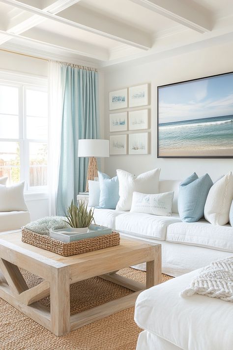 Transform your home with this serene coastal living room decor. Featuring soft blues and natural textures, it brings the calm of the seaside into your space. Perfect for achieving a tranquil and stylish look. #livingroomdecor #coastalstyle #homedecor 🌊 Sophisticated Coastal Living Room, Blue And White Living Room Apartment, Coastal Living Room Area Rugs, Coastal Themed Living Room, Nautical Home Decor Coastal Style, Classy Beach Decor, Colorful Beach House Interior, Coastal Design Living Room, Coastal Throw Pillows Living Room