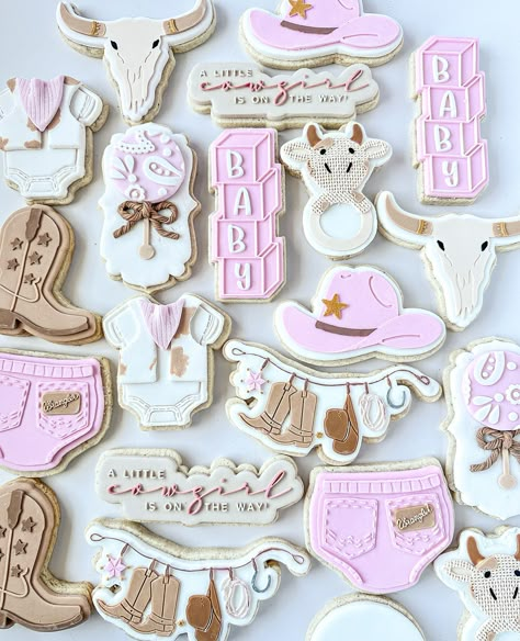 Shipped off these absolutely adorable GLUTEN FREE Cowgirl themed baby shower cookies over the weekend 🤠🐄 Availability for custom orders are nearly closed for the year, so get in quick and fill out the online order form using our link in bio 🐮 #babyshower #babygirl #babygirlcookies #babygirl🎀 #babyshowercookieset #babyshowerideas #babyshowercake #babyshowerdecor #cowgirl #cowboy #farm #cowgirlstyle #cowgirls #cookie #cookies #cookiedecorating #cookieart #cookiecuttersets #sugarcookies #suga... Girl Baby Shower Ideas Western Theme, Boots Or Bows Gender Reveal Cookies, Boots Or Bows Cookies, Country Baby Shower Ideas Girl, A Little Cowgirl Is On Her Way Baby Shower Ideas, Country Girl Baby Shower Ideas, Boots And Bows Baby Shower Ideas, Rodeo Baby Shower Ideas Girl, Farm Baby Shower Cookies