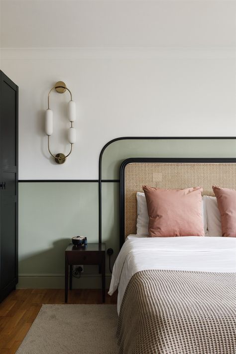 A modern take on 1920’s style is what this pastel schemed bedroom is all about. Mylands Grenstone™ No. 190, a soft grey-green paint, sits wonderfully alongside Maugham White No.2, a serene bright white shade, creating a perfectly balanced scheme that complements the room’s art deco interior. Interior design by Charlotte Burley of @whitstableview.interiors _________ Art deco bedroom – art deco interior - wall painting colour combination ideas – pastel aesthetic Wainscoting Ideas Bedroom, 1920s Home Interior, Resort Bedroom, Calming Bedroom Colors, Green Grey Paint, Natural Mood, Art Deco Bedroom, Calming Bedroom, Online Interior Design Services