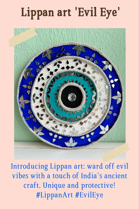 Lippan art is a captivating form of wall decoration that incorporates mirrors, clay, and intricate patterns. The mirrors embedded in the artwork can be seen as symbolic of warding off negative energy or deflecting harmful glances, which aligns with the broader belief in the evil eye in some Indian cultures. Evil Eye Lippan Art, Economics Notes, Evil Eye Art, Lippan Art, Evil Eye Design, Mirror Artwork, Blouse Work, Flower Art Painting, Mirror Art