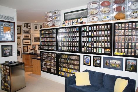 Displaying your sports memorabilla and card collections can be overwhelming but if organized correctly, you'll be able to enjoy it much better Sports Memorabilia Room, Sports Cards Display, Baseball Card Displays, Sports Memorabilia Display, Trading Card Display, Sports Man Cave, Card Room, Memorabilia Display, Ultimate Man Cave