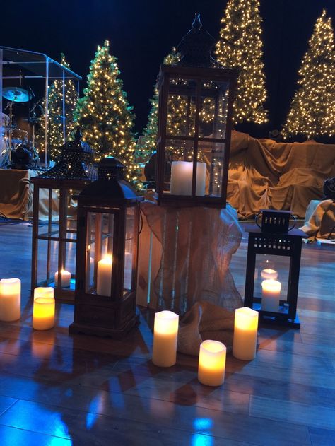 Lanterns-1 Christmas Worship Stage Ideas, Candle Light Stage Design, Christmas Platform Ideas, Modern Church Christmas Decor, Sanctuary Decor Church Stage Design, Christmas Stage Design Church, Church Christmas Decorations Lobby, Christmas Stage Decor, Christmas Church Decorations Sanctuary