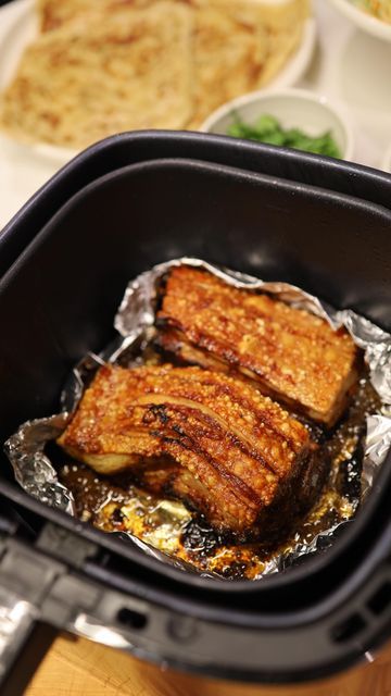 Simone Anderson (Forsyth) on Instagram: "Crispy pork belly (in your air fryer) Traditional crispy pork belly takes hours, a lot of care and is hard to quickly whip up. This air fryer version is quick, and easy great for a mid week dinner even in a hurry. Perfect for entertaining, sure was to impress! We love in bao buns or roti for a DELISH meal. Nipples are a personal choice 🤣🤣🤣🤣🤣 Ingredients * pork belly * 6 cloves of garlic minced * 2 tablespoons oyster sauce * ½ teaspoon garlic salt * ¼ Simone Anderson, Pork Belly Recipes, Crispy Pork Belly, Bao Buns, Crispy Pork, Oyster Sauce, Pork Dishes, Garlic Salt, Pork Belly