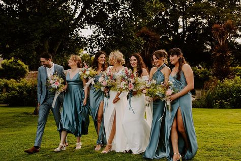 Mixed gender wedding party with bridesmaids and bridesmain in blue wedding outfits Mixed Bridal Party Gender, Mixed Bridal Party, Mixed Gender Wedding Party, Mixed Gender Bridal Party, Bridal Party Blue, Pastel Wedding Decor, Wedding Decor Spring, Whimsical Summer Wedding, Pastel Wedding Decorations