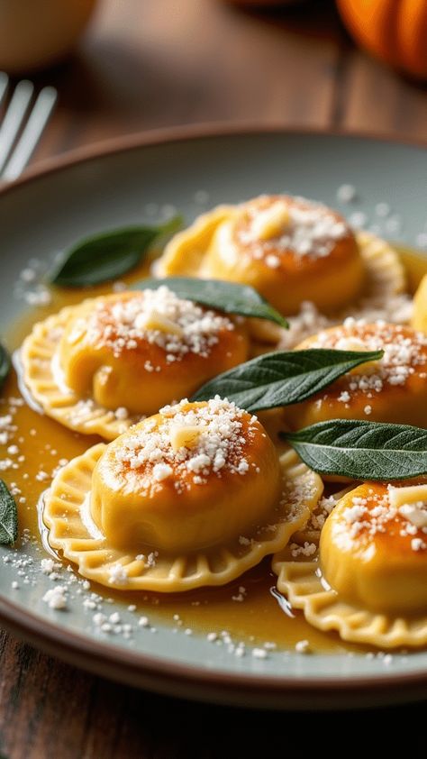 Pumpkin Ravioli with Sage Brown Butter Dinner Hosting, Halloween Cooking, Sage Brown Butter, Pumpkin Dinner, Pumpkin Ravioli, Ravioli Bake, Brown Butter Sauce, Homemade Ravioli, Savory Cheese