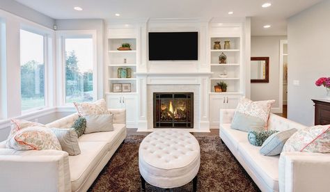 Bookshelves next to fireplace