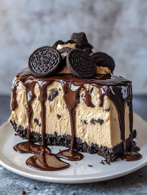 Best recipes ever | Oreo peanut butter cheesecake drip cake | Facebook Recipes Tower, Oreo Peanut Butter, Best Recipes Ever, Crushed Oreo, Oreo Crust, Peanut Butter Cheesecake, Cake Making, Drip Cake, Best Food Ever