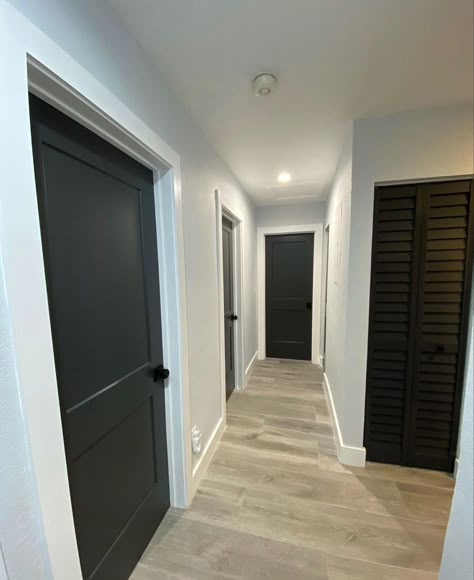 Black Doors In Basement, House With Black Doors Inside, Farmhouse Interior Door Colors, Black Doors Interior, Interior Door Colors, Painted Interior Doors, Black Interior Doors, Hallway Design, Cracked Pepper