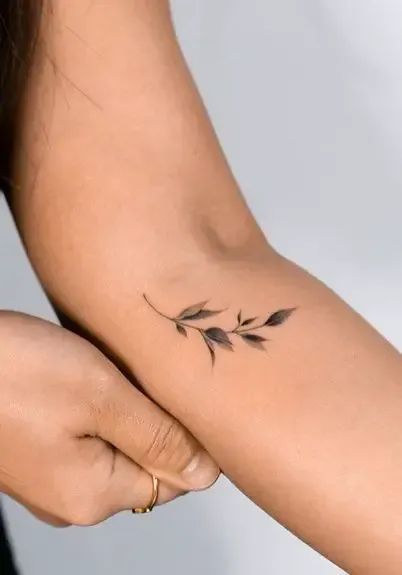 Name Vine Tattoo, Bay Leaf Tattoo Design, Delicate Leaf Tattoo, Leaf And Vine Tattoos, Willow Leaf Tattoo Arm, Matching Leaf Tattoos, Linear Flower Tattoo, Leaf Tattoo Forearm, Single Leaf Tattoo