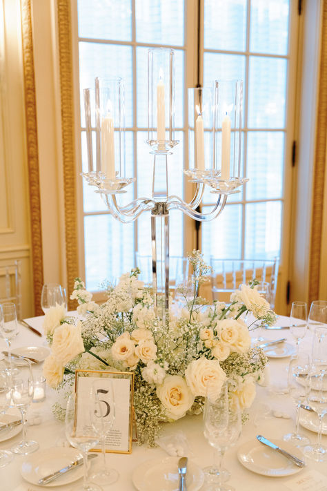 Each round table at this Westgate Hotel wedding was adorned in babies breath, white roses and candleabras. Photographer: Carrie McGuire Photo | Florist: Mr. Floral & Events Wedding Round Table Candles, Whimsical Centerpiece Wedding, Candleabras Wedding Centerpiece, Wedding Round Table Flowers, Wedding Round Table Decorations, Round Wedding Table Decorations, Round Table Wedding Decor, Candleabra Wedding, Round Table Centerpieces Wedding