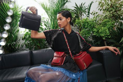 The Petite Liaison in Noir (black) + Revolution Red Croco, layered with the Bandolier Crossbody in Revolution Red.  Up your accessories game at sansbeast.com Black Revolution, Handbags For Work, Bucket Backpack, Water Bottle Bag, Shopping Totes, Everyday Backpack, Vegan Handbags, Vegan Bags, Bottle Bag