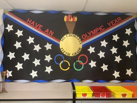 Sports Day Backdrop Ideas, Olympics School Theme Bulletin Boards, Olympic Back To School Theme, Olympic Classroom Door, Olympic Bulletin Boards For School, Olympics School Theme, Olympic School Theme, Olympic Bulletin Board Ideas, Olympic Decorations