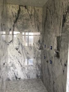 Bathroom Grey Countertop, Stone Shower Walls, Granite Shower, Bathroom Grey, Yellow Bathroom Decor, Granite Bathroom, Stone Shower, Grey Countertops, Stone Bathroom