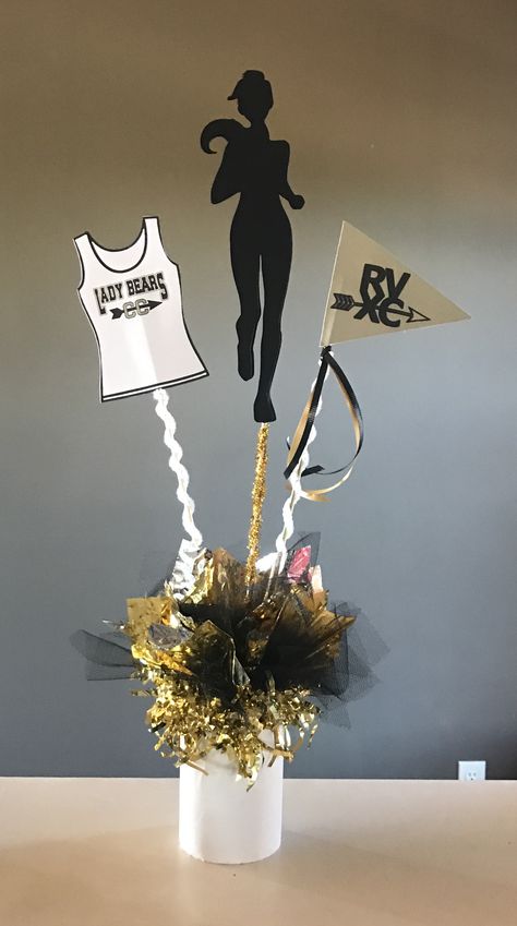 Table decor for cross country banquet using Silhouette Cameo.  Base is glass votive holder, skewers, team jersey & pennant printed & cut from Silhouette. End Of Season Cross Country Gifts, Running Table Decor, Athletic Banquet Table Decorations, Cross Country Graduation Party Ideas, Cross Country Centerpieces, Running Centerpieces, Track And Field Party Decorations, Cross Country Party Ideas, Cross Country Centerpiece Ideas