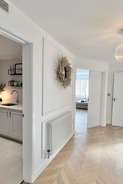 Cosy white Windsor columns in a beautiful minimal hallway over at @l.h_home. Shop the timeless rad. Hallway Radiator Ideas, Hallway Radiators, Cosy Hallway, Hallway Radiator, Minimal Hallway, Radiator Ideas, Tall Radiators, Victorian Hall, Decorative Radiators