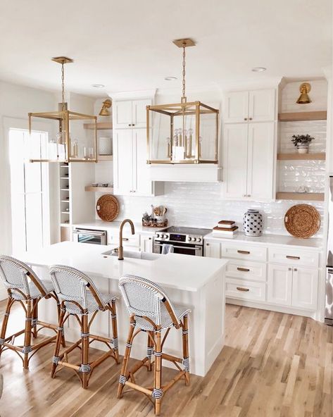 Gorgeous coastal white kitchen decorated with blue accents. Click to shop all of the kitchen decor including the Serena and Lily barstools. #kitchendesign #coastaldecor #coastal #ltkhome Buy Kitchen Cabinets, Lake House Kitchen, Best Kitchen Cabinets, Ashley Home, All White Kitchen, Custom Kitchen Cabinets, Coastal Kitchen, Serena And Lily, Chic Kitchen