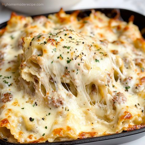 Creamy Sausage Ravioli, Sausage Alfredo Ravioli Lasagna, Ravioli Recipe Alfredo, Rana Ravioli Recipe, Sausage Alfredo Lasagna, Four Cheese Ravioli Recipe, Sausage Alfredo Bake, Sausage Lasagna Recipe, Alfredo Ravioli