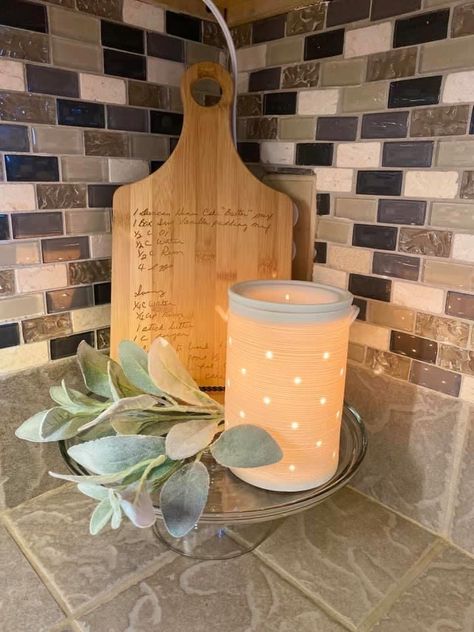 Start — or expand — your Silhouette Collection with this simply patterned warmer. Etches in the porcelain shine through when lit, creating a uniquely textured, glowing warmer. Perfect home decor piece Wax Warmer Decor Ideas, Wax Warmer Decor, Etched Core Scentsy Warmer, Scentsy Wax Warmer, Warm Bathroom, Colored Light Bulbs, Couch Ideas, Scentsy Warmers, Warm Kitchen