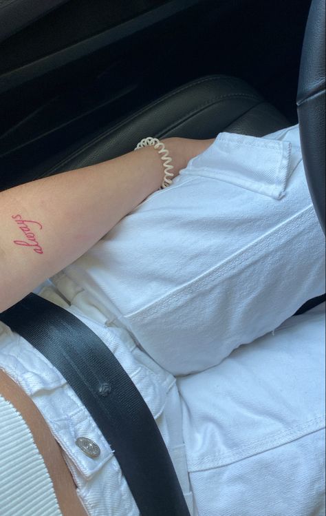 red always tattoo on arm Red Bicep Tattoo, Red Inner Arm Tattoo, Red Arm Tattoo, Word Tattoos On Arm, Small Name Tattoo, Arm Tattos, Tattoos 2022, Amor Tattoo, Moving On Tattoos