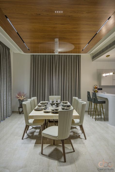 A Luxurious, Contemporary 4BHK Villa In Baroda | Creat.int Studio - The Architects Diary Drawing Room Concept, Veneer Ceiling, False Ceiling Ideas, Dining Area Design, False Ceiling Designs, Cladding Design, Room Concept, House Ceiling, Pop Ceiling