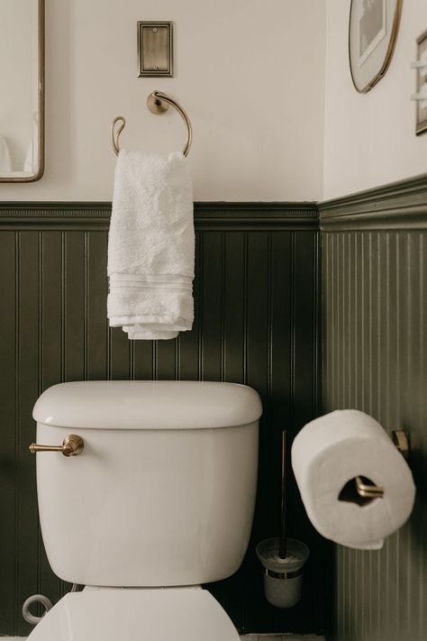 Bathroom Green Beadboard, Green Chair Rail Bathroom, Dark Olive Green Wainscoting, Bathroom Painted Beadboard, Half Bathroom Beadboard, Olive Green Beadboard Bathroom, Dark Green And Brass Bathroom, Olive Beadboard, Olive And Black Bathroom