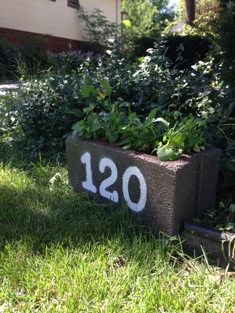 Address number planter -- recycled cinder block, spray paint, homemade stencils Concrete Blocks Ideas, Decorative Concrete Blocks, Mailbox Planter, Homemade Stencils, Paint Edger, Living Naturally, Mailbox Makeover, Homemade Garden, Cinder Blocks