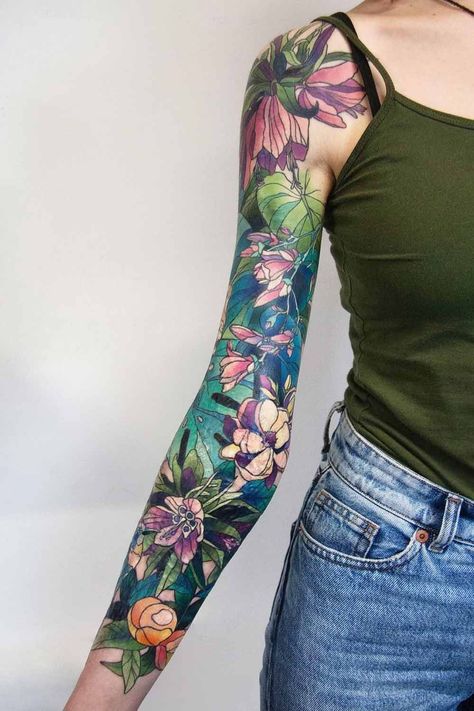 Embrace the power of sleeve tattoos and let your arm tell a unique story. Explore ideas at Glaminati.com! #glaminati #sleevetattoo #tattooideas #tattoosleeves #tattoosleeve #sleevestattoo #tattoosleevesforwomen #femaletattoosleeves #tattoosleevesformen #mentattoosleeves #halfsleevetattoo #tattoodesigns Color Sleeve Tattoo Women, Exotic Flower Tattoos, Sleeve Tattoo Women, Colorful Sleeve Tattoos, Infinity Tattoo With Feather, Shoulder Sleeve Tattoos, Vine Tattoos, Floral Tattoo Sleeve, Flower Sleeve