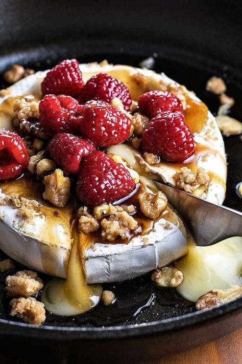 Raspberry and Walnut Baked Brie! Warm baked brie topped with brown sugar, candied walnuts, and raspberries soaked in a honey balsamic sauce. | HomemadeHooplah.com Handheld Food For A Crowd, Lunch Party Recipes, Homemade Hooplah, Balsamic Sauce, Brie Recipes, Honey Balsamic, Baked Brie, Food Platters, Iftar