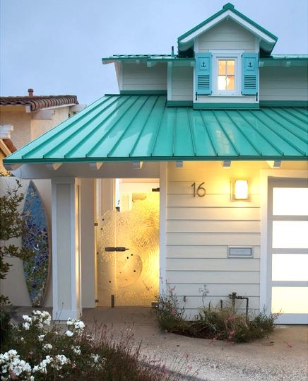 Turquoise roof, shutters with anchors, wave glass entry door and surfboard shower. Wow! Take the tour here: http://beachblissliving.com/turquoise-beach-cottage/ Beach house | coastal home #beachhouse #coastalcottage #beachcottage Green Metal Roof, Beach Cottage Style Decor, Case Creole, Coronado Beach, House Of Turquoise, Pintura Exterior, Dream Beach Houses, Beach Shack, Beach House Style