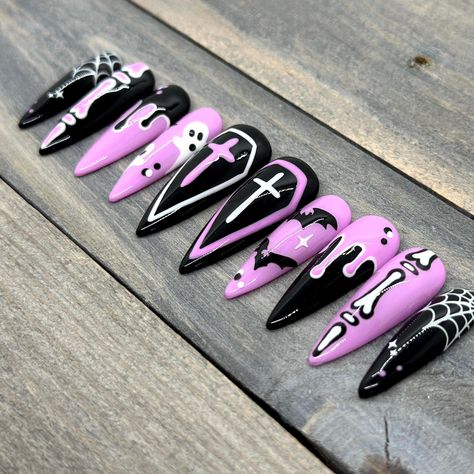 Pink and Black Halloween Press On Nails | Hand-Drawn Coffins, Crosses, Ghosts, Slime Drip, Bones, Bats, and Spiderwebs Goth Nails Halloween, Goth Pastel Nails, Pastel Goth Nails Short, Planchette Nails, Pastel Witch Nails, Pink Black Halloween Nails, Girly Goth Nails, Kawaii Goth Nails, Bat Nails Designs