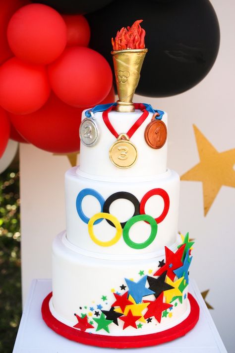 Kids Olympic Birthday Party, Olympic Games Party Ideas, Olympic Birthday Party Ideas, Olympic Themed Desserts, Olympic Games Birthday Party, Olympic Themed Birthday Party, Olympic Theme Birthday Party For Kids, Olympic Theme Cake, Olympic Birthday Cake