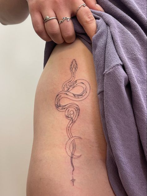 Fineline snake tattoo Snakes And Vines Tattoo, Snake With Stars Tattoo, Snake Nature Tattoo, Pretty Snake Tattoos For Women, Wrap Around Wrist Tattoos Snake, Snake Tattoo On Stomach For Women, Dainty Snake Spine Tattoo, Year Of Snake Tattoo, Snake Leaves Tattoo