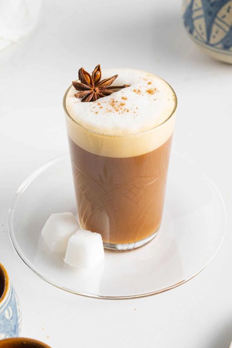 Learn how to make this authentic Moroccan coffee that's infused with warm, sweet spices like cardamom, cinnamon, and nutmeg in under 10 minutes. Mediterranean Coffee Recipes, Nutmeg Coffee Recipe, Moroccan Drinks, Spanish Coffee Recipe, Cardamom Latte, Cardamom Coffee, Moroccan Coffee, Spanish Coffee, Espresso Recipes