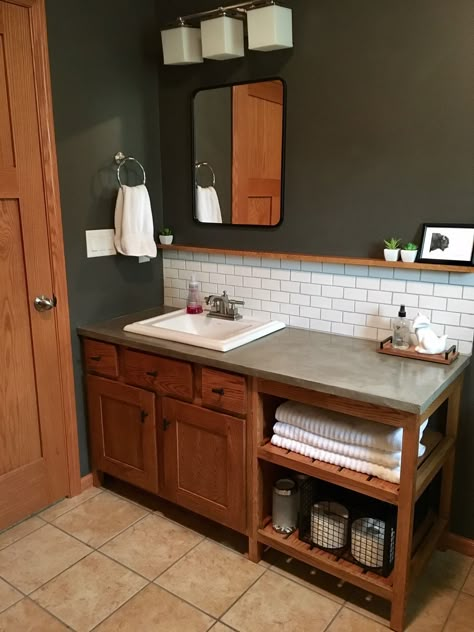 Concrete countertops in the bathroom. Used ardex feather finish over a cheap laminate countertop. A standard 36” Bathroom vanity was extended with open shelves. Redo Countertops, Ardex Feather Finish, Bathroom Vanity Redo, Vanity Redo, Laminate Countertop, Concrete Countertops Bathroom, Kitchen Countertops Laminate, Standard Bathroom, Countertops Concrete