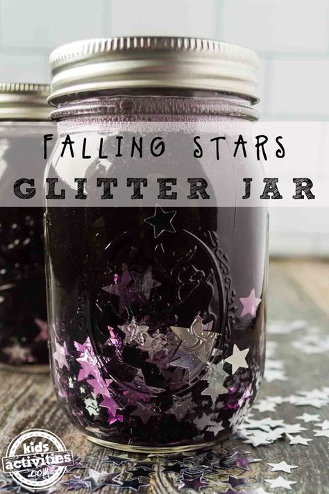 Easy DIY Falling Stars Glitter Jar Craft for Kids Sensory Bottle | Kids Activities Blog Galaxy Jar Craft, Galaxy Jars Diy For Kids Easy, Glitter Calming Jar, Glitter Jars Calming Diy, Glitter Sensory Bottles, Oil Water Glitter Sensory Bottle, Calming Jar, Galaxy Crafts, Homemade Glitter