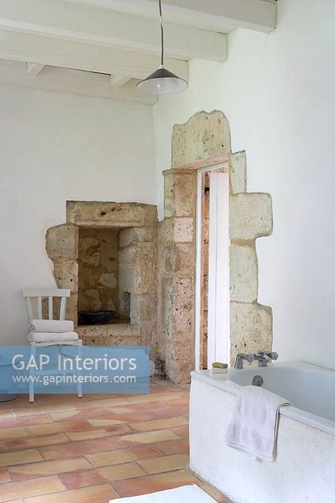 Exposed stone walls in bathroom Exposed Stone Wall Interior, Indoor Stone Wall, Exposed Stone Wall, Walls In Bathroom, Snug Ideas, Uk Cottage, Stone Doorway, France House, Limewash Walls