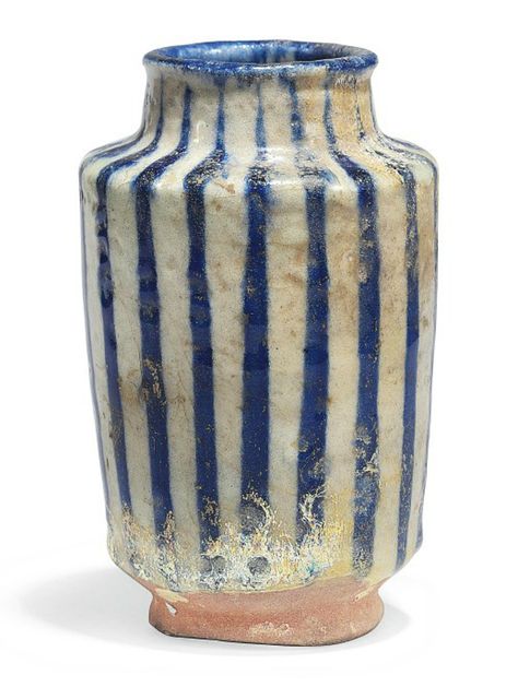 AN INTACT KASHAN POTTERY ALBARELLO  CENTRAL IRAN, 12TH CENTURY. Of typical form with slightly flaring walls on short ring foot, with short neck and rounded lip, the decoration with cobalt-blue lines on white ground, with old inventory number to foot Iranian Ceramics, Short Ring, Ancient Pottery, Blue Lines, Short Neck, Vase Ceramic, Antique Pottery, Antique Vase, Ceramics Ideas Pottery