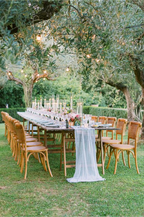 From the editorial "This Couple Got Married at Sting's Villa in Tuscany and It Was Nothing Short of Spectacular." The reception dinner took place in the Tuscan hills under sparkling olive trees with romantic floral arrangements that were absolutely dreamy. Just wait until you see the full gallery!  ​Photography: @eliaskordelakos  #tuscanywedding #destinationwedding #alfrescowedding #weddingreception #gardenwedding Candles And Flowers, Alfresco Wedding, Romantic Italian, Garden Wedding Reception, Villa Wedding, Outdoor Dinner, Table Set Up, Tuscany Wedding, Wedding Table Settings