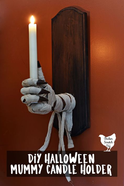 Halloween is best experienced by candlelight so why not DIY a spooky Mummy Hand Candle Holder? All you need is a trip to the craft store and a little Halloween magic to Illuminate your creepy decorations! Wall Candle Holders Diy, Diy Halloween Candle Holders, Mummy Candles, Hand Candle Holder, Mummy Hand, Gothic Diy Decor, Creepy Decorations, Creepy Candles, Halloween Candlesticks