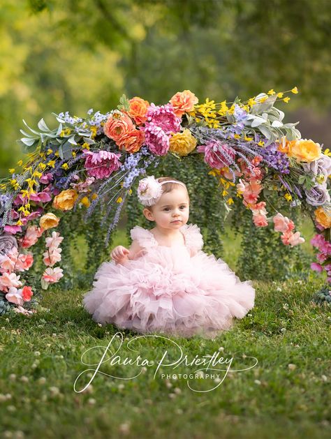 beautiful baby girl sitting in the grass has her portraits taken under a floral arch, and has a cake smash with a little white and pink cake Spring Picture Ideas, Floral Birthday Cake, Easter Photoshoot, Easter Photography, Morgantown Wv, Mini Session Ideas, Toddler Photos, Spring Pictures, Easter Photos