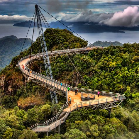 Langkawi Sky Bridge is a 125 metres (410 ft) curved pedestrian cable-stayed bridge in Malaysia Scary Bridges, Kuala Lampur, Langkawi Malaysia, Cable Stayed Bridge, Sky Bridge, Malaysia Travel, Banana Boat, Pedestrian Bridge, Suspension Bridge