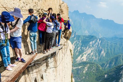 The World's Deadliest Trail: Climbing Mount Huashan Review Hotel Swimming Pool, Mount Hua, Dangerous Roads, China Travel, Greek Islands, Beautiful Islands, Tourist Destinations, Tourist Attraction, Best Hotels