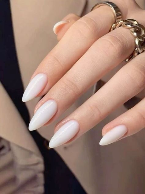 As autumn arrives with its warm hues and cozy vibes, white fall nails stand out as a fresh, stylish choice for the season. Crisp, versatile, and effortlessly chic, white nails blend beautifully with fall colors while adding a unique twist. From elegant whites with glitter accents to trendy ombré effects and matte finishes, white nail designs are perfect for fall. In this guide, we’ll explore creative ideas to elevate your fall manicure, featuring various styles like white marble nails, gold acce Autumn Nails White, Russian Manicure Almond Nails, Almond White Nails Design, White Almond Shaped Nails, Winter Nails Minimalist, Russian Manicure Design, White Nude Nails, Women Acrylic Nails, Almond Nails White